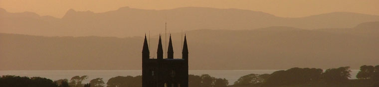 The Langdales provide the backdrop to the spires of the main building of the former Lancaster Moor Hospital.